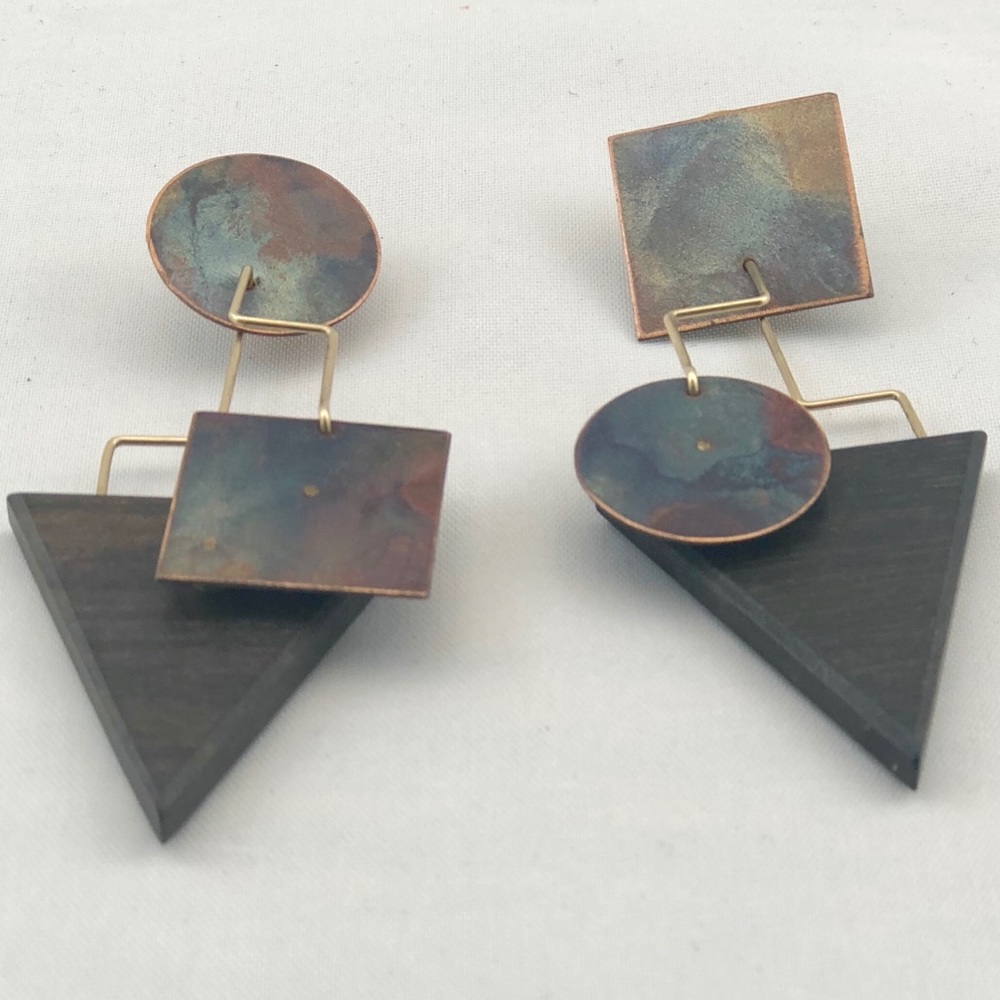 Handmade asymmetrical earrings. Previously Owned
